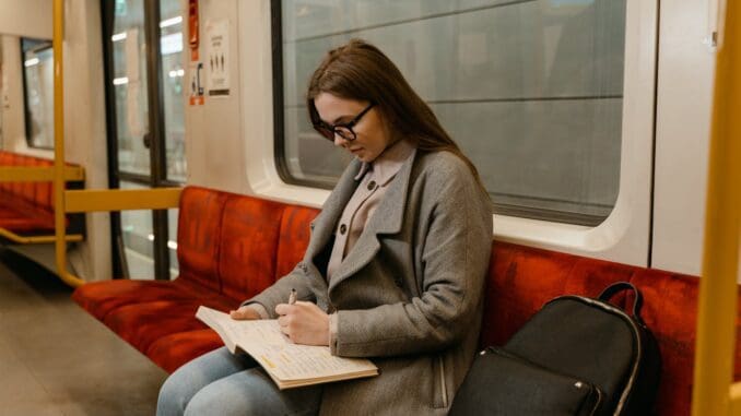 woman doing CBT homework assignment 